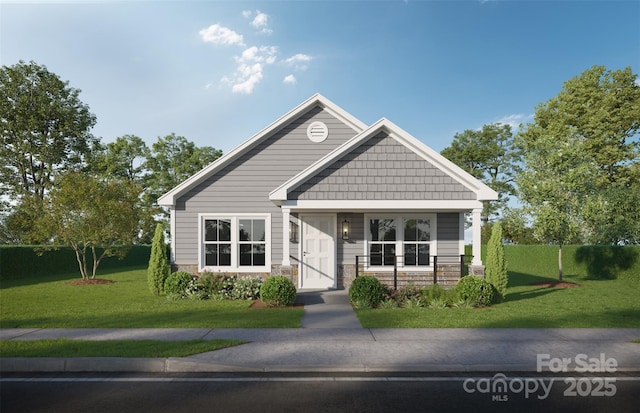 view of front of house with a front lawn and covered porch