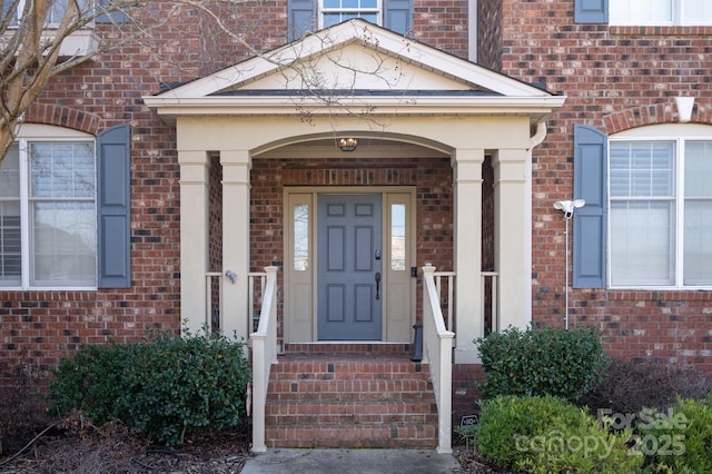 409 Running Horse Ln, Waxhaw, NC 28173 - property entrance featuring brick siding