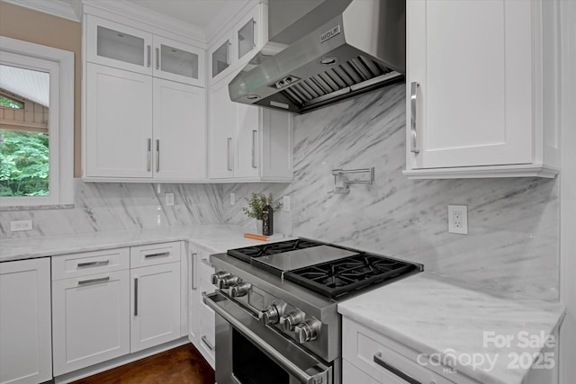 409 Running Horse Ln, Waxhaw, NC 28173 - kitchen featuring high end stove, exhaust hood, tasteful backsplash, and glass insert cabinets