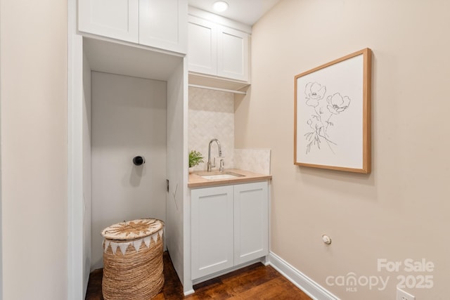 409 Running Horse Ln, Waxhaw, NC 28173 - bathroom featuring tasteful backsplash, wood finished floors, baseboards, and vanity