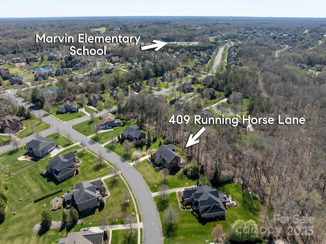 409 Running Horse Ln, Waxhaw, NC 28173 - view of property location featuring nearby suburban area and a forest