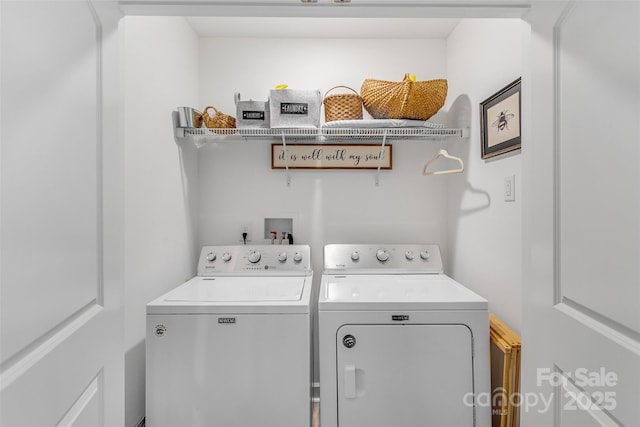 laundry area featuring washer and clothes dryer