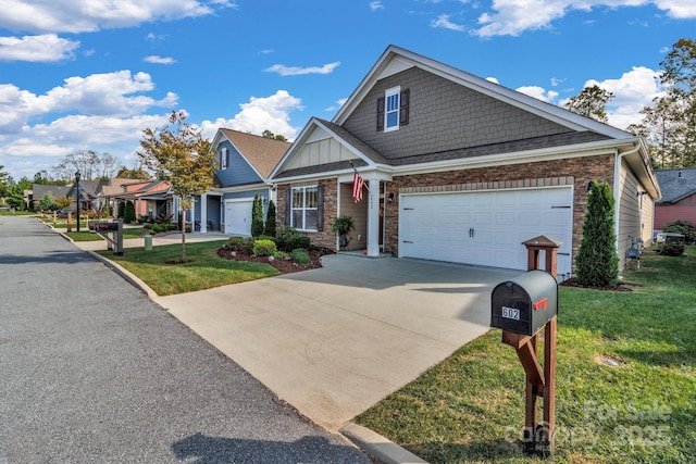 craftsman inspired home featuring a garage and a front yard