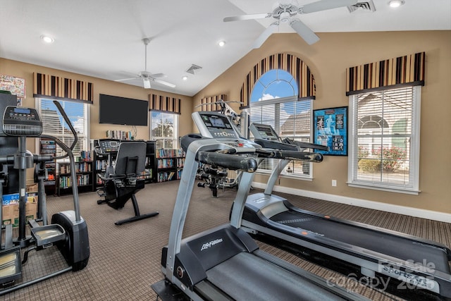 gym with ceiling fan, lofted ceiling, and carpet