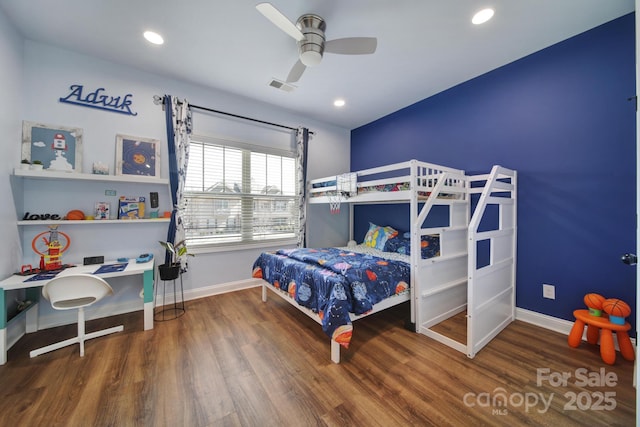 bedroom with baseboards, visible vents, dark wood-style flooring, and recessed lighting