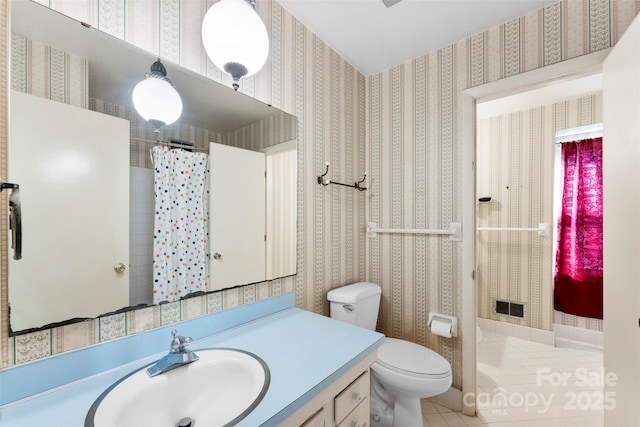 bathroom featuring vanity, tile patterned floors, toilet, and a shower with shower curtain