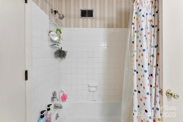 bathroom with shower / bath combo