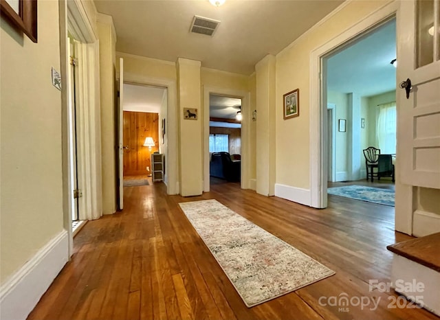 hallway featuring wood-type flooring