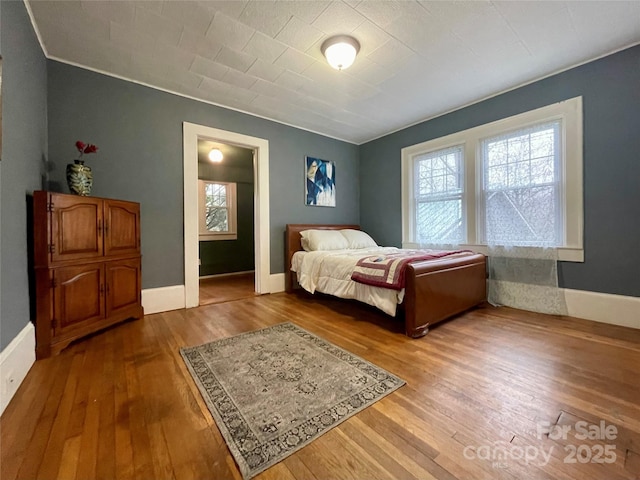 bedroom featuring hardwood / wood-style flooring