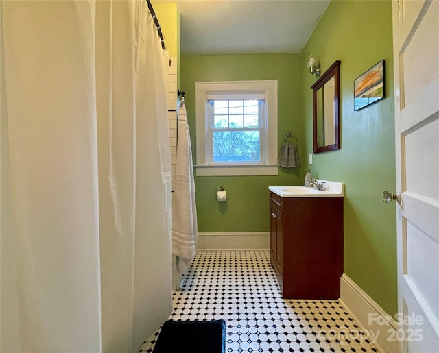 bathroom featuring vanity and walk in shower