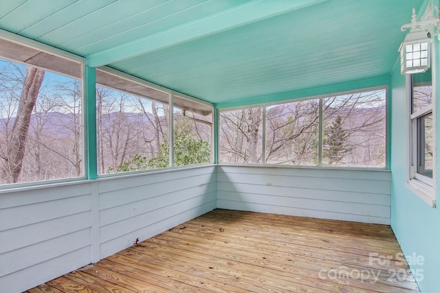 unfurnished sunroom with a healthy amount of sunlight