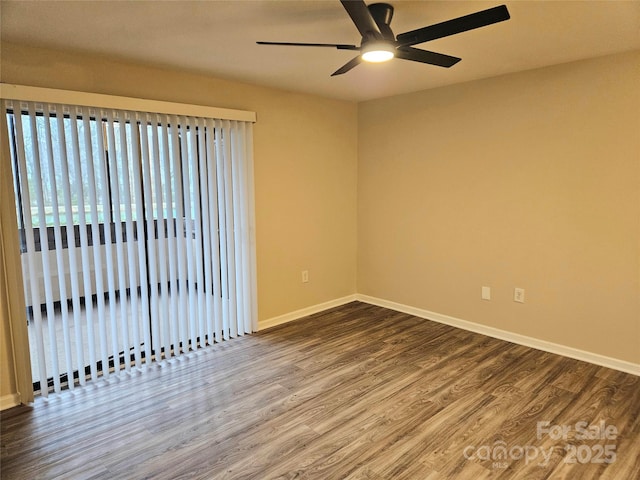 empty room with hardwood / wood-style flooring and ceiling fan