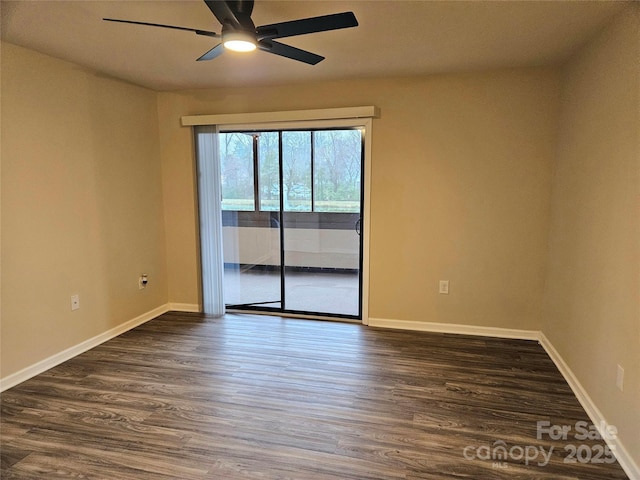 unfurnished room with ceiling fan and dark hardwood / wood-style flooring