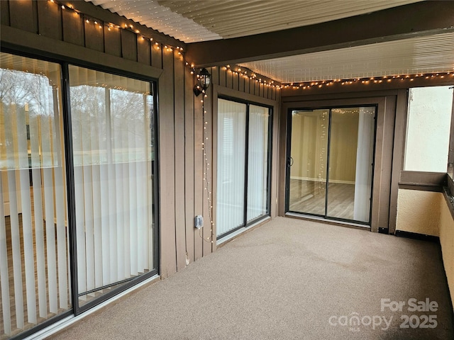 view of unfurnished sunroom