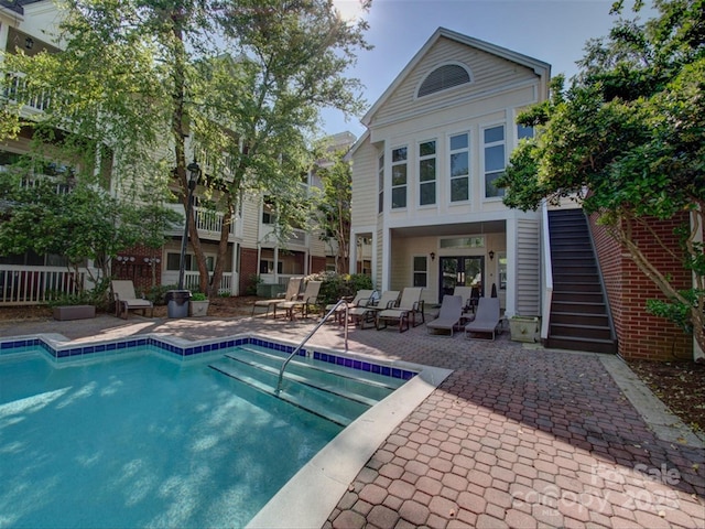 view of pool with a patio