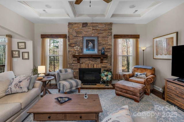 living room featuring beam ceiling, wood finished floors, and coffered ceiling