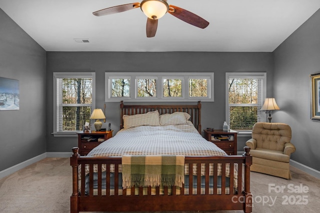 bedroom featuring visible vents, carpet floors, baseboards, and ceiling fan