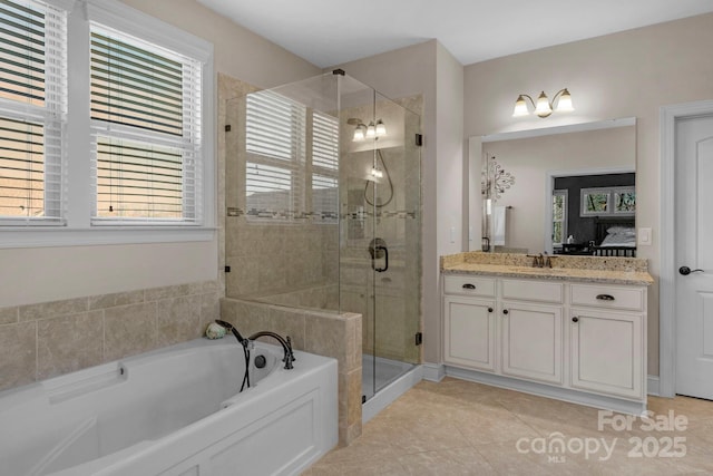 full bathroom with tile patterned floors, a shower stall, a bath, and vanity