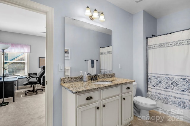 full bathroom featuring vanity, curtained shower, and toilet