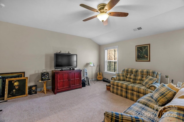 living room with visible vents, baseboards, lofted ceiling, carpet floors, and a ceiling fan