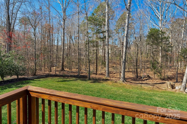 view of yard with a forest view