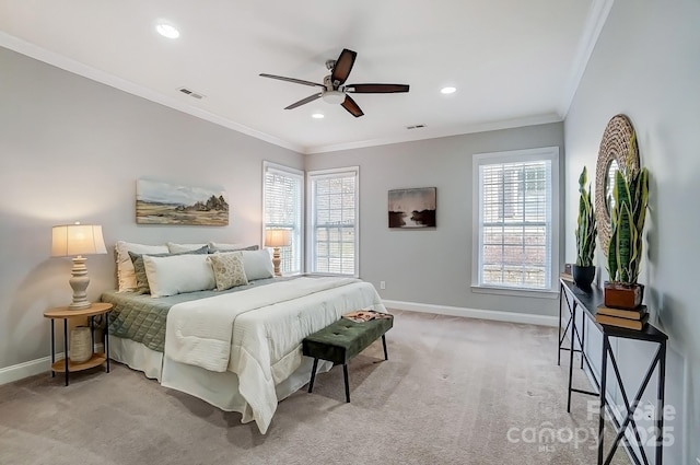 bedroom featuring ornamental molding, light colored carpet, visible vents, and baseboards