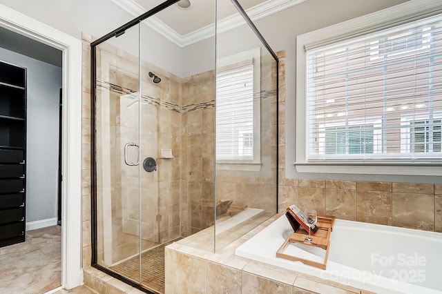 bathroom featuring a garden tub, a shower stall, and ornamental molding