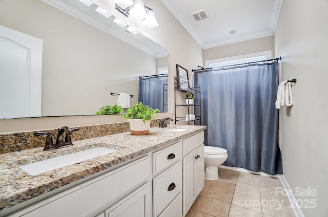 full bathroom featuring double vanity, visible vents, tile patterned floors, crown molding, and a sink