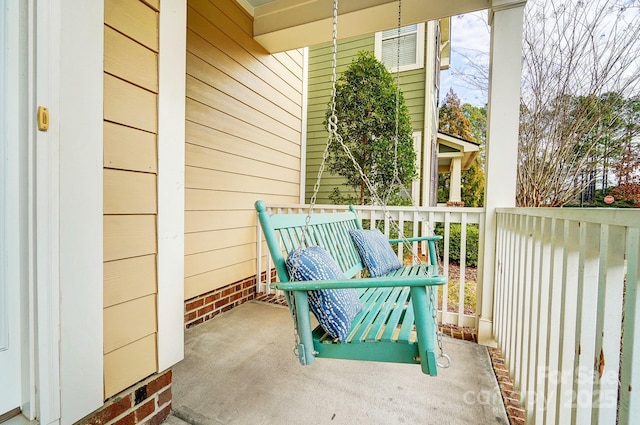 balcony featuring a porch