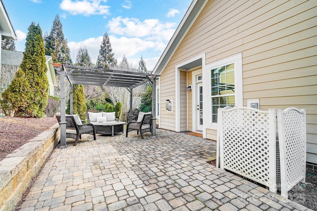 view of patio featuring outdoor lounge area and a pergola