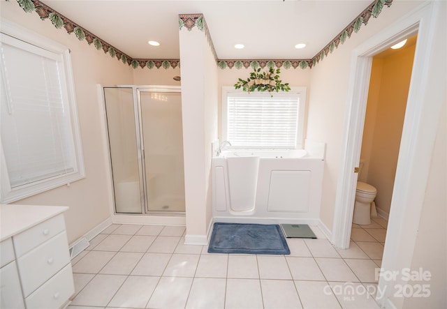 1 Carnoustie Ct, Campobello, SC 29322 - full bathroom with shower with separate bathtub, toilet, tile patterned floors, and vanity