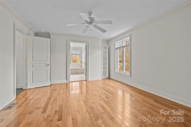 unfurnished bedroom with crown molding, ceiling fan, and light wood-type flooring