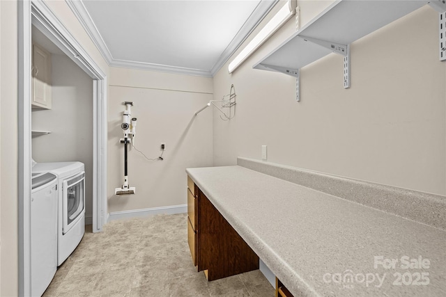 washroom with crown molding, light colored carpet, cabinets, and washing machine and clothes dryer