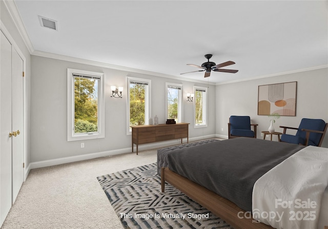 carpeted bedroom with crown molding, ceiling fan, and multiple windows