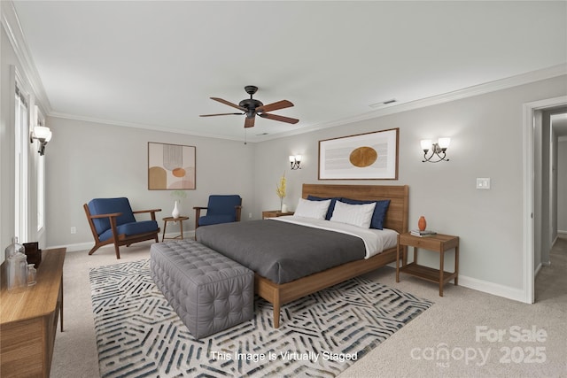 bedroom featuring crown molding, light colored carpet, and ceiling fan