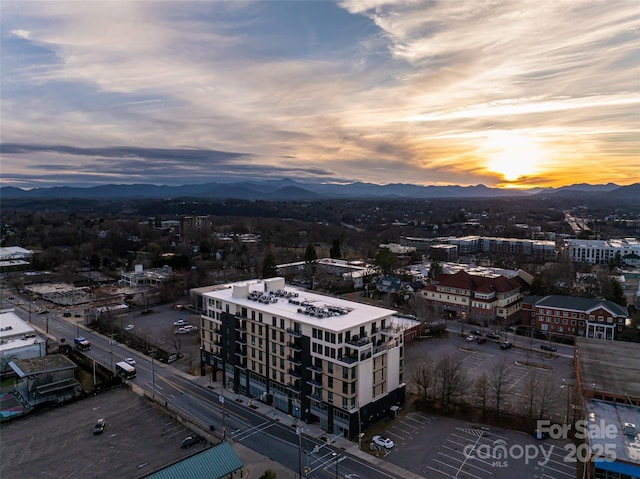 aerial view at dusk with a mountain view