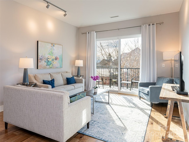 45 Asheland Ave Unit 302, Asheville, NC 28801 - living room with hardwood / wood-style flooring and track lighting