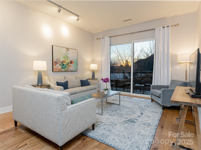 45 Asheland Ave Unit 302, Asheville, NC 28801 - living room with hardwood / wood-style floors
