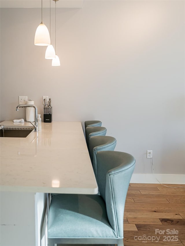 45 Asheland Ave Unit 302, Asheville, NC 28801 - dining space with sink and wood-type flooring