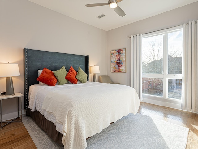 45 Asheland Ave Unit 302, Asheville, NC 28801 - bedroom featuring ceiling fan and light hardwood / wood-style floors