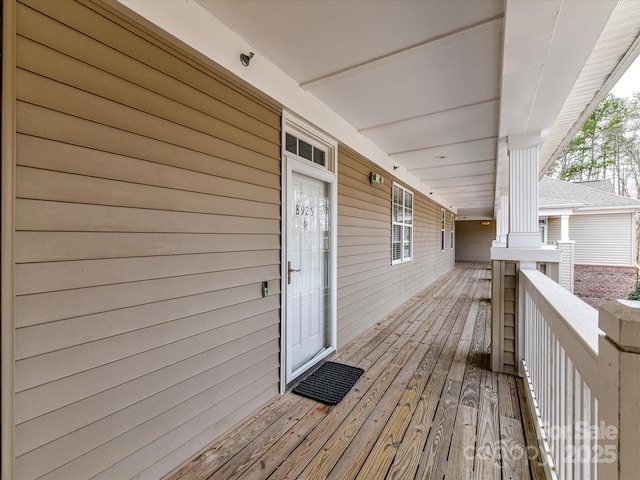 wooden deck featuring a porch