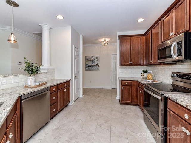 kitchen with crown molding, pendant lighting, stainless steel appliances, and light stone counters