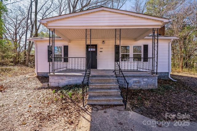 bungalow-style house featuring covered porch