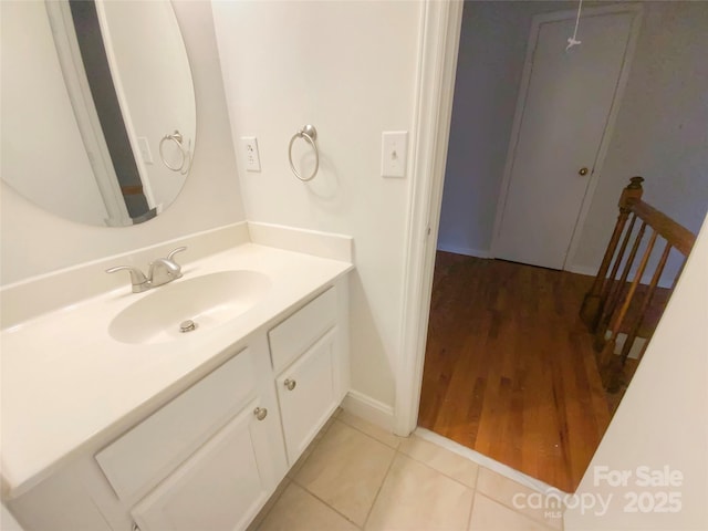 bathroom with vanity and tile patterned floors