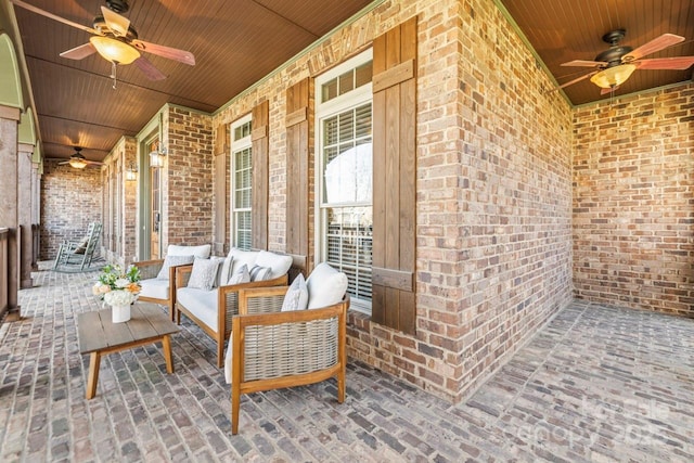 view of patio / terrace featuring ceiling fan