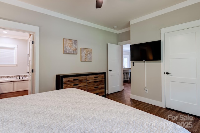 bedroom featuring ensuite bathroom, ceiling fan, ornamental molding, and dark wood finished floors