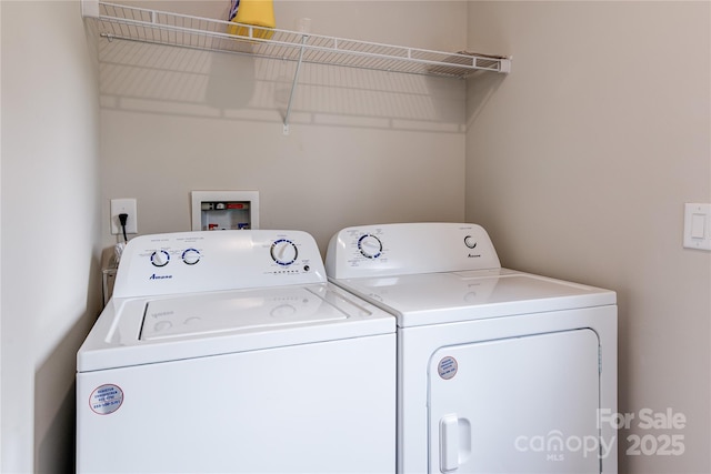 laundry area featuring laundry area and washing machine and dryer