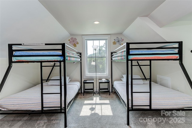 bedroom featuring carpet, vaulted ceiling, and recessed lighting