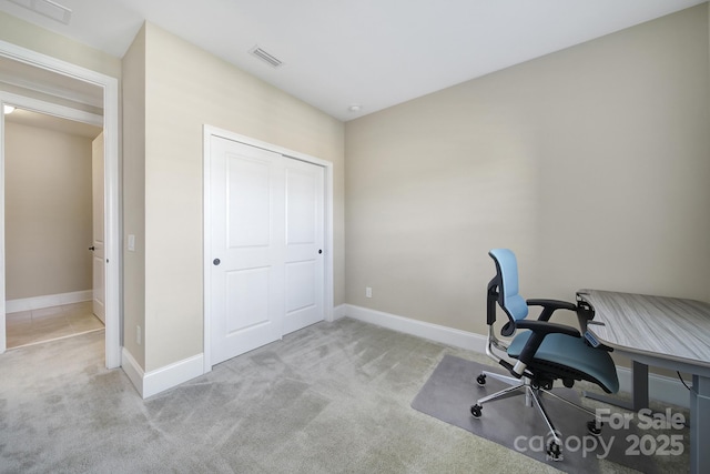 home office with visible vents, carpet floors, and baseboards