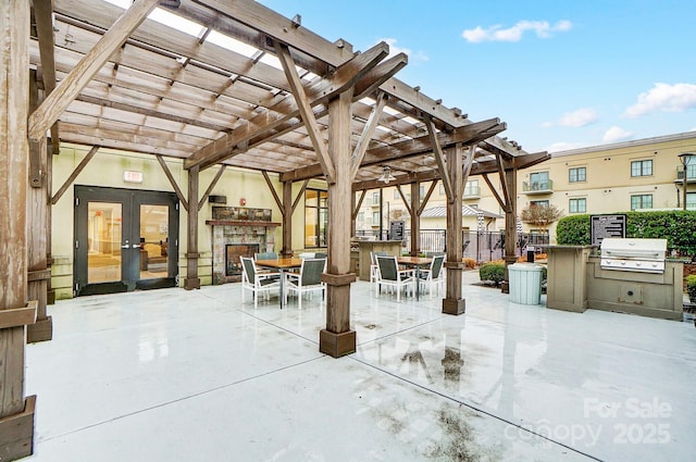 view of patio / terrace featuring french doors, a pergola, and grilling area